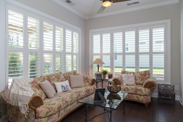 Sunroom with interior shutters in Austin.